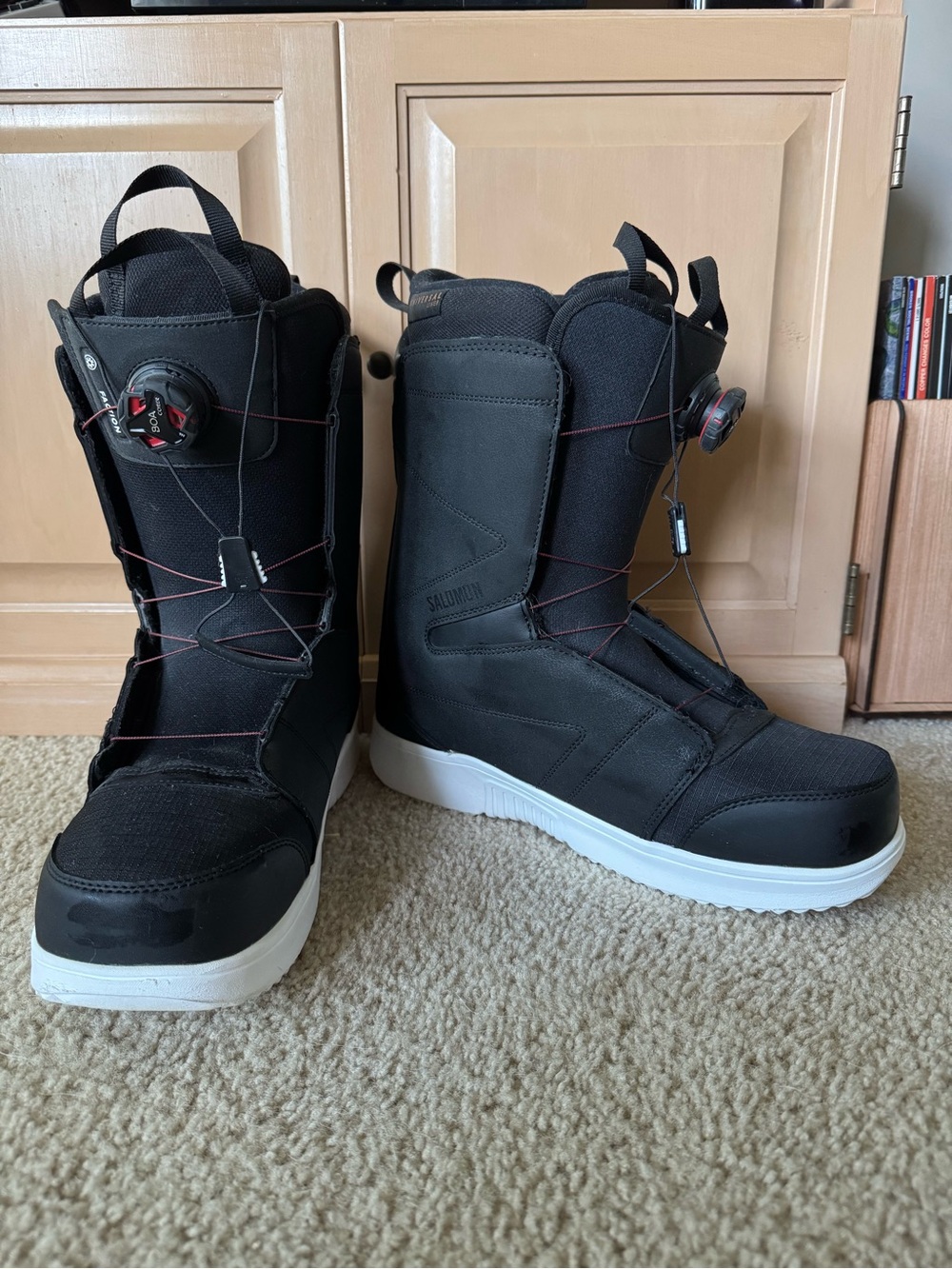 Salomon Faction Black Snowboard Boots with White Soles and Red Lacing Accents